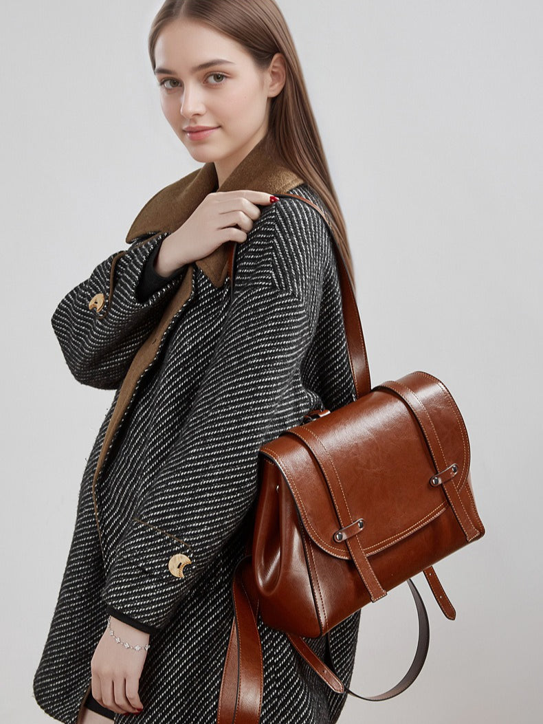 The Oil-Waxed Genuine Leather Convertible Flap Backpack Shoulder Bag