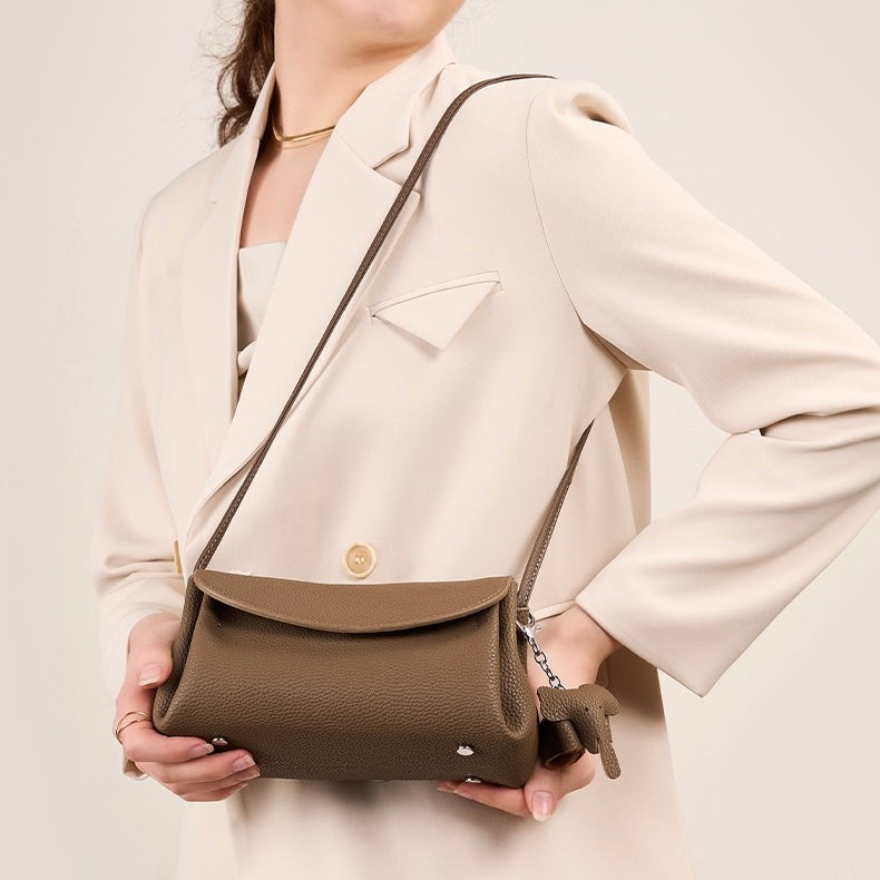 Exquisite Genuine Leather Crossbody Bag with Mini Elephant Pendant